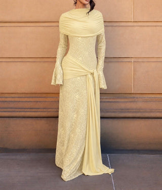 ROSALIE dress in butter yellow lace, full-length front view against a sandstone wall